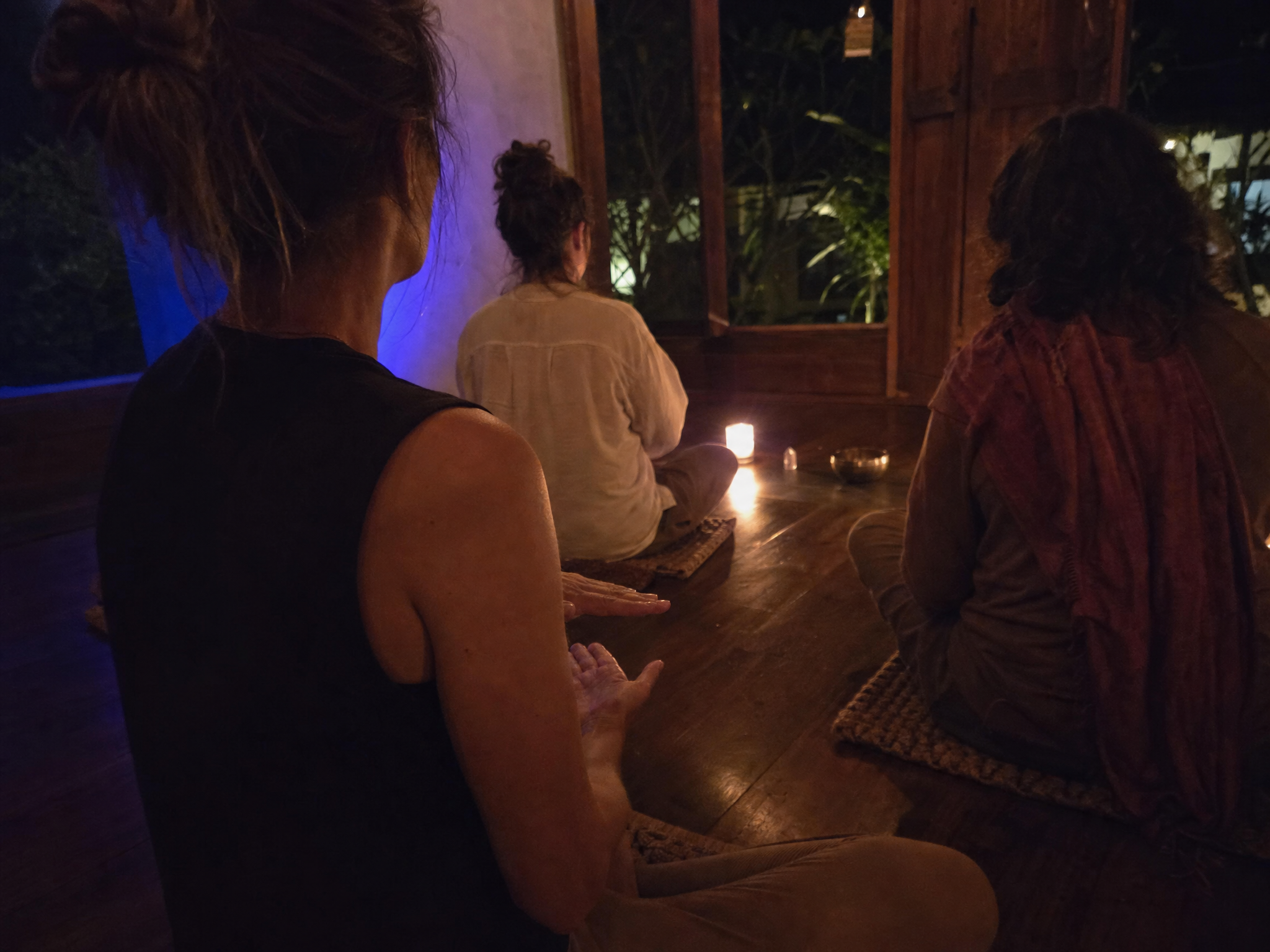 Participant seated in a quiet Counterplane Awakening practice room