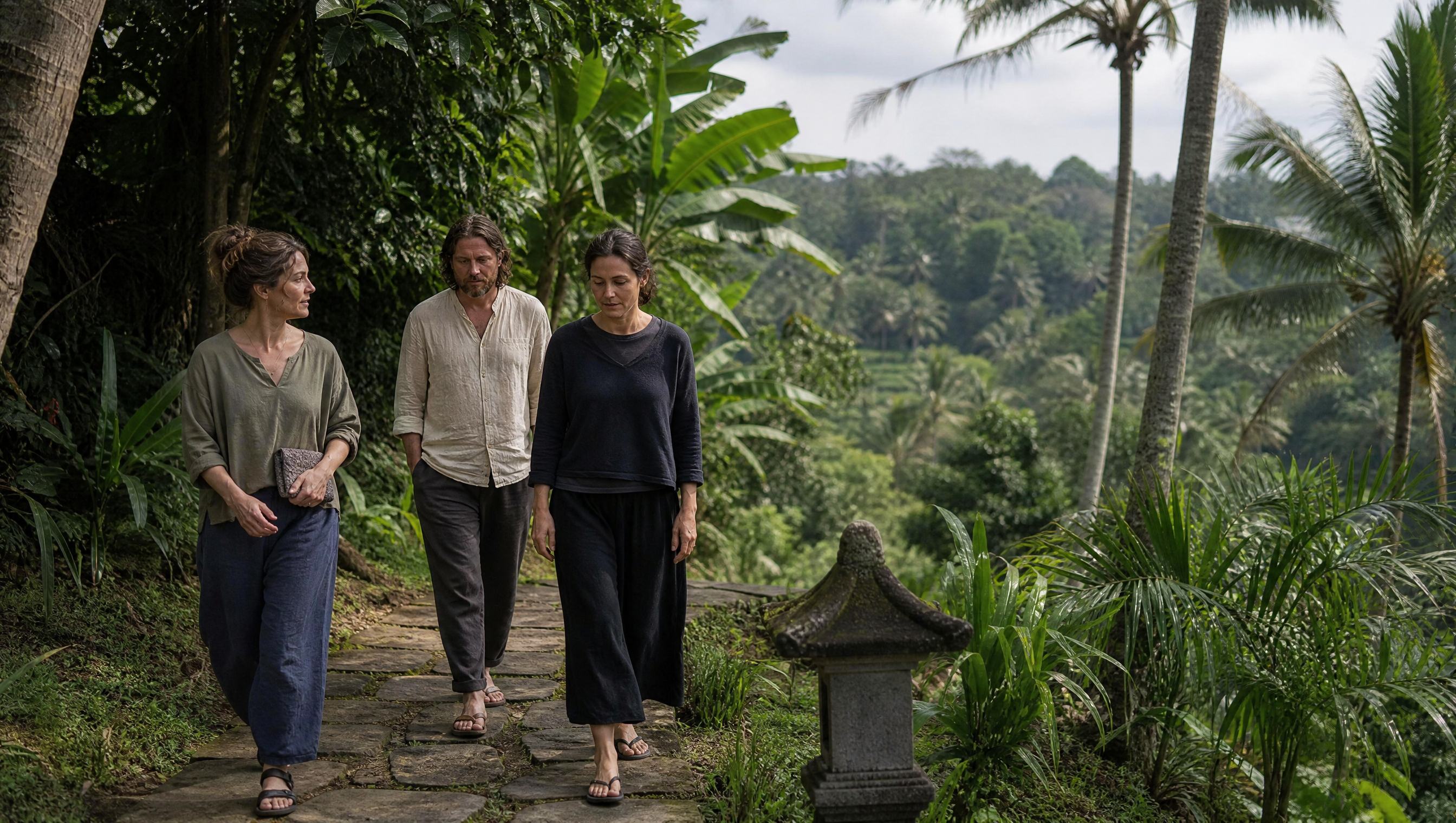 Counterplane Awakening retreat participants walking on a tropical garden path